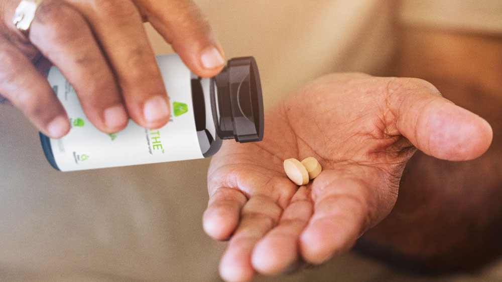 dispensing tablets from  omnibreathe bottle onto hand